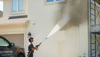 Pressure cleaning in Albuquerque, NM for stucco, siding, and concrete on a residential exterior